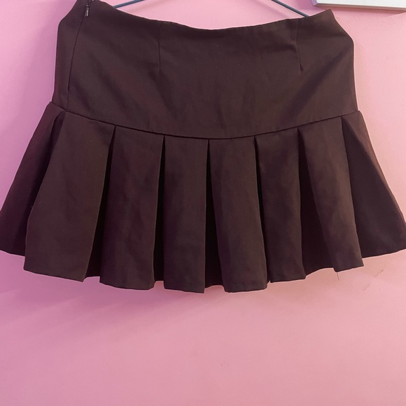 Dresses & Skirts - Short pleated Skater skirt by Globus with button and concealed zip at one side.